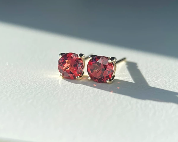 Round Garnet Stud Earrings in 9K Yellow Gold