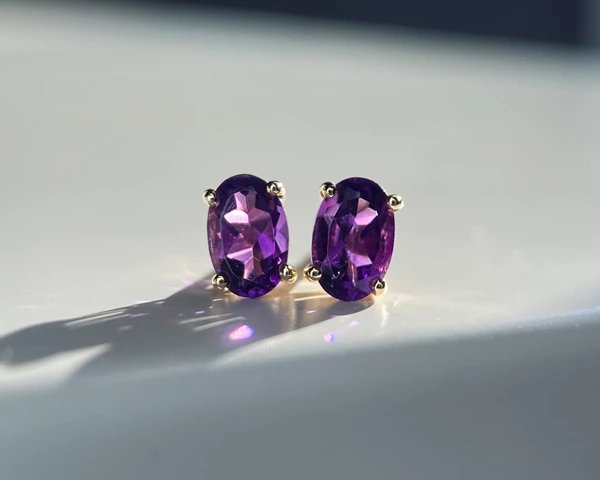 Oval Amethyst Stud Earrings in 9K Yellow Gold
