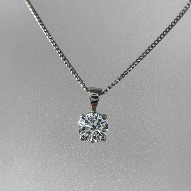 0.86ct Round Brilliant Ettore Diamond Pendant and 18" Curb Chain in Platinum