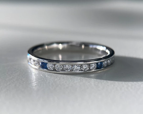 Platinum 2.7mm Full Channel Set Blue Sapphire and Diamond Ring