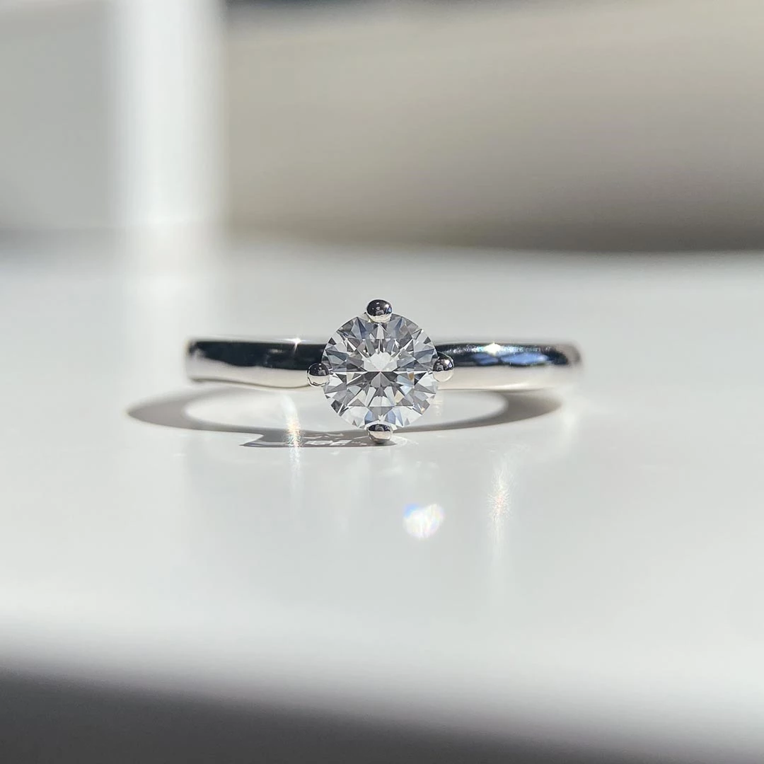 0.57ct Round Brilliant Abbraccio Diamond Ring in Platinum