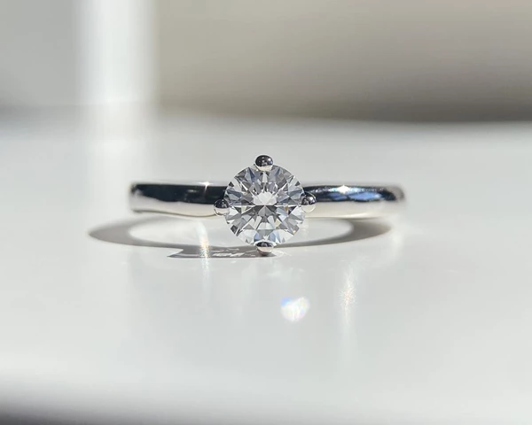 0.57ct Round Brilliant Abbraccio Diamond Ring in Platinum