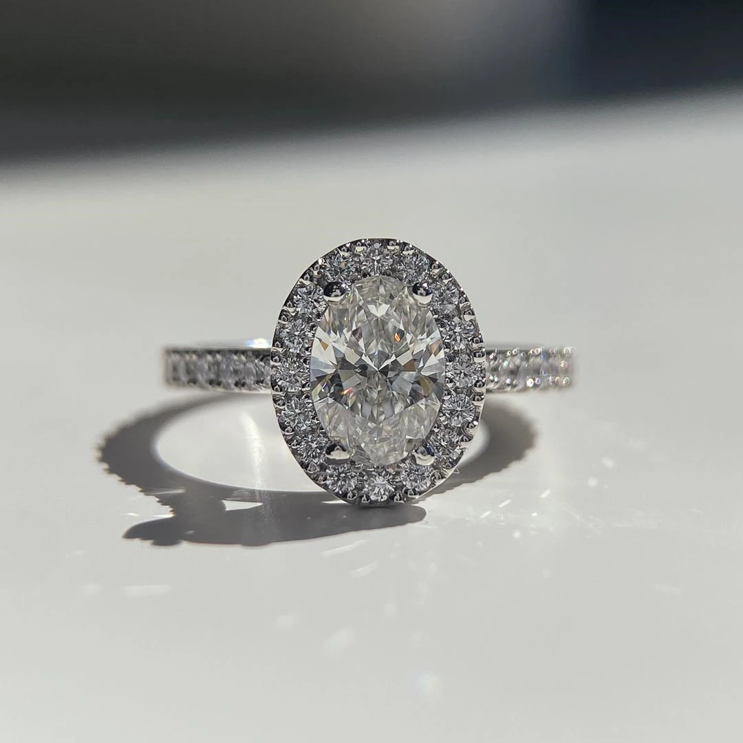 0.71ct Lab-Grown Oval Diamond set Halo Ring in Platinum