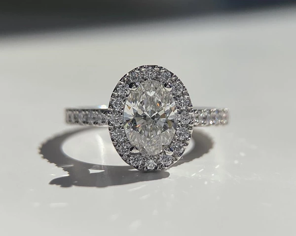 0.71ct Lab-Grown Oval Diamond set Halo Ring in Platinum