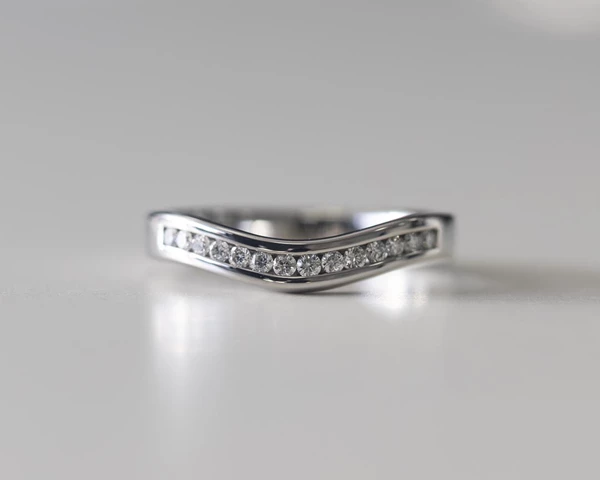 Platinum 2.9mm One Third Slight Wave Channel Set Diamond Ring